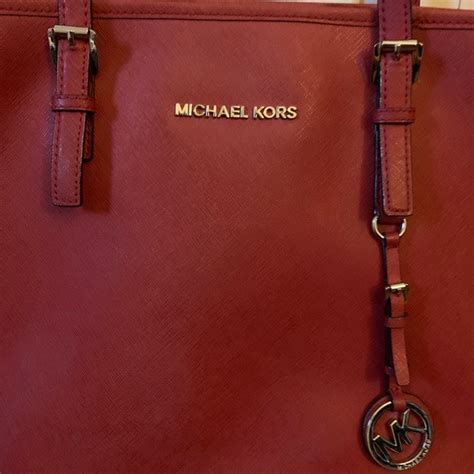 burgundy michael kors|michael kors maroon bag.